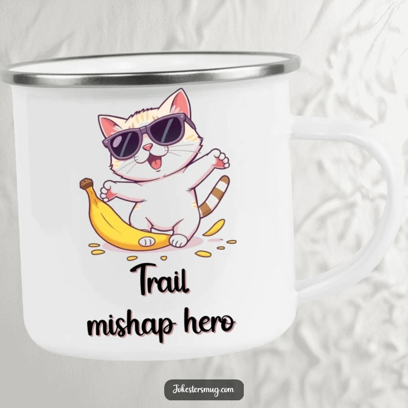 Funny cat sunglasses camping mug showing a cat in oversized shades tripping on a banana peel, body parts comically scattered.