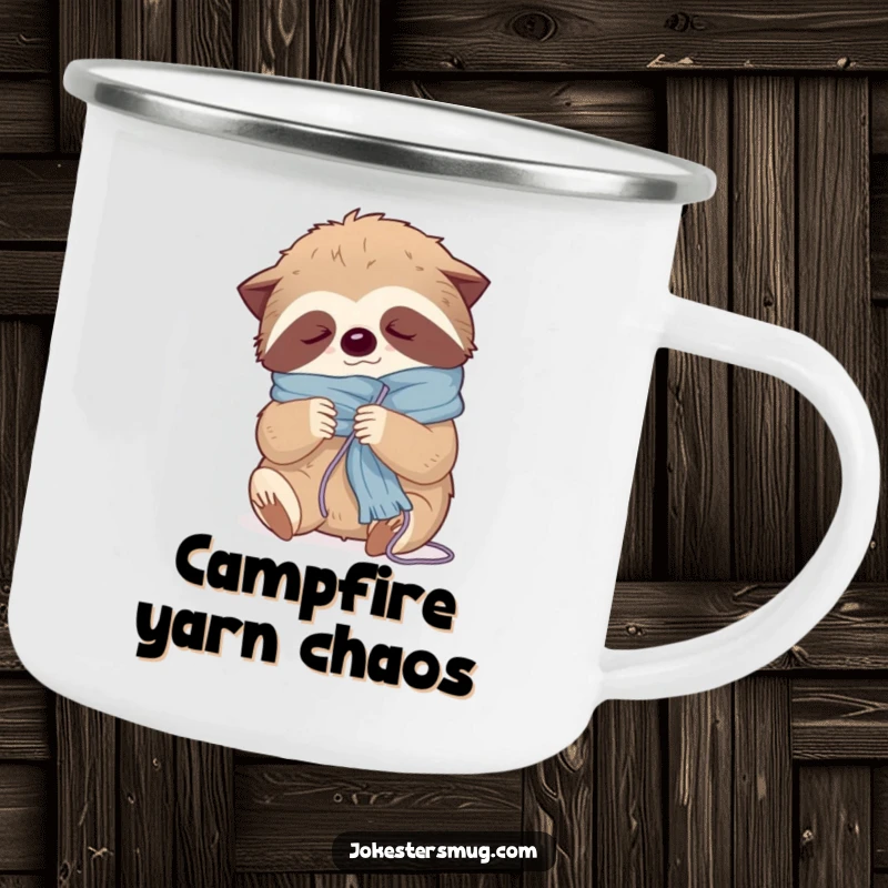 Funny camping mug showing a sleepy sloth tangled in yarn while knitting a scarf, perfect for slow mornings outdoors.