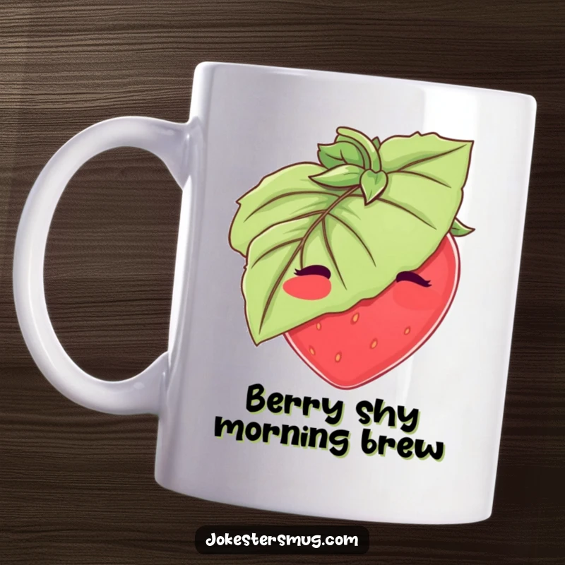 Funny Strawberry Mug: A blushing strawberry comically tries to hide behind a large leaf. Cute and funny gift for fruit fans.