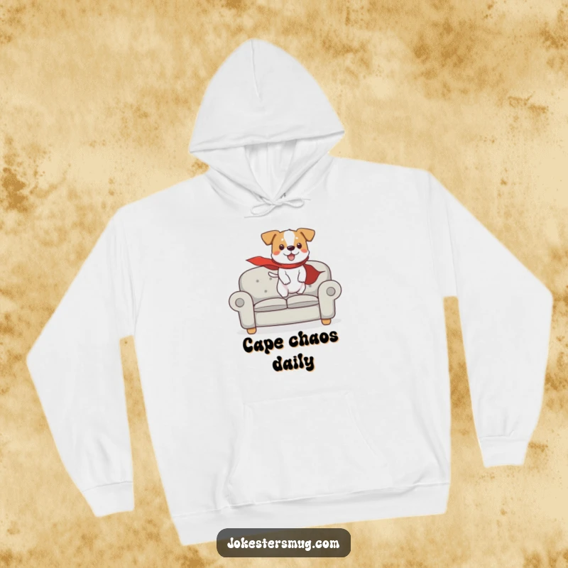 Funny hoodie with a dog wearing a cape, humorously attempting flight from a couch, offering cozy comfort and superhero charm.