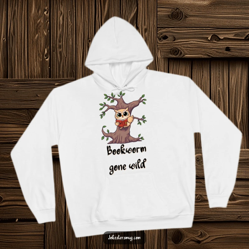 Funny hoodie depicting a startled owl losing its balance and falling from a tree while firmly holding onto a book.