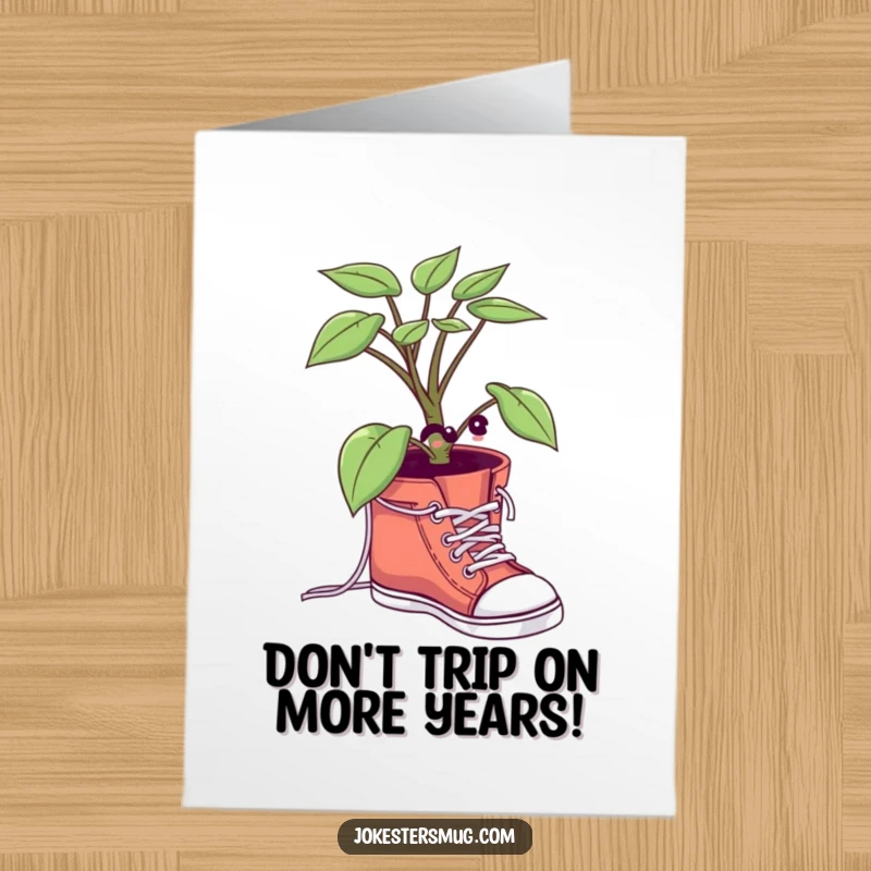 Funny Free Printable Birthday Card showing a potted plant comically struggling to tie its own shoelaces.