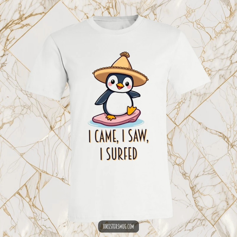 Funny t-shirt featuring a penguin with a sombrero attempting to surf on a floating ice chunk, a comical and adventurous arctic character.