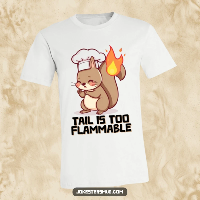 Funny t-shirt with a squirrel in a chef hat accidentally setting its tail on fire, a comical kitchen mishap.