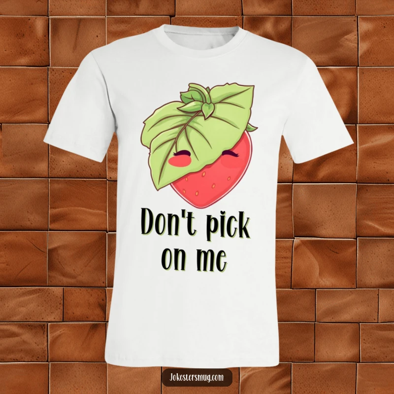 Funny Strawberry T-Shirt: A blushing strawberry attempts to conceal itself behind a big green leaf. Adorable and funny gift.