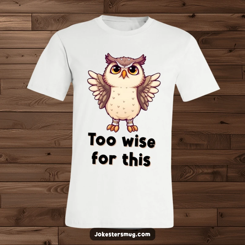 Funny owl attempting to put socks on its wings, looking utterly confused, printed on a t-shirt for a humorous statement.